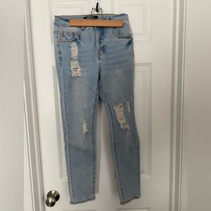 Light wash distressed skinny jeans as 27